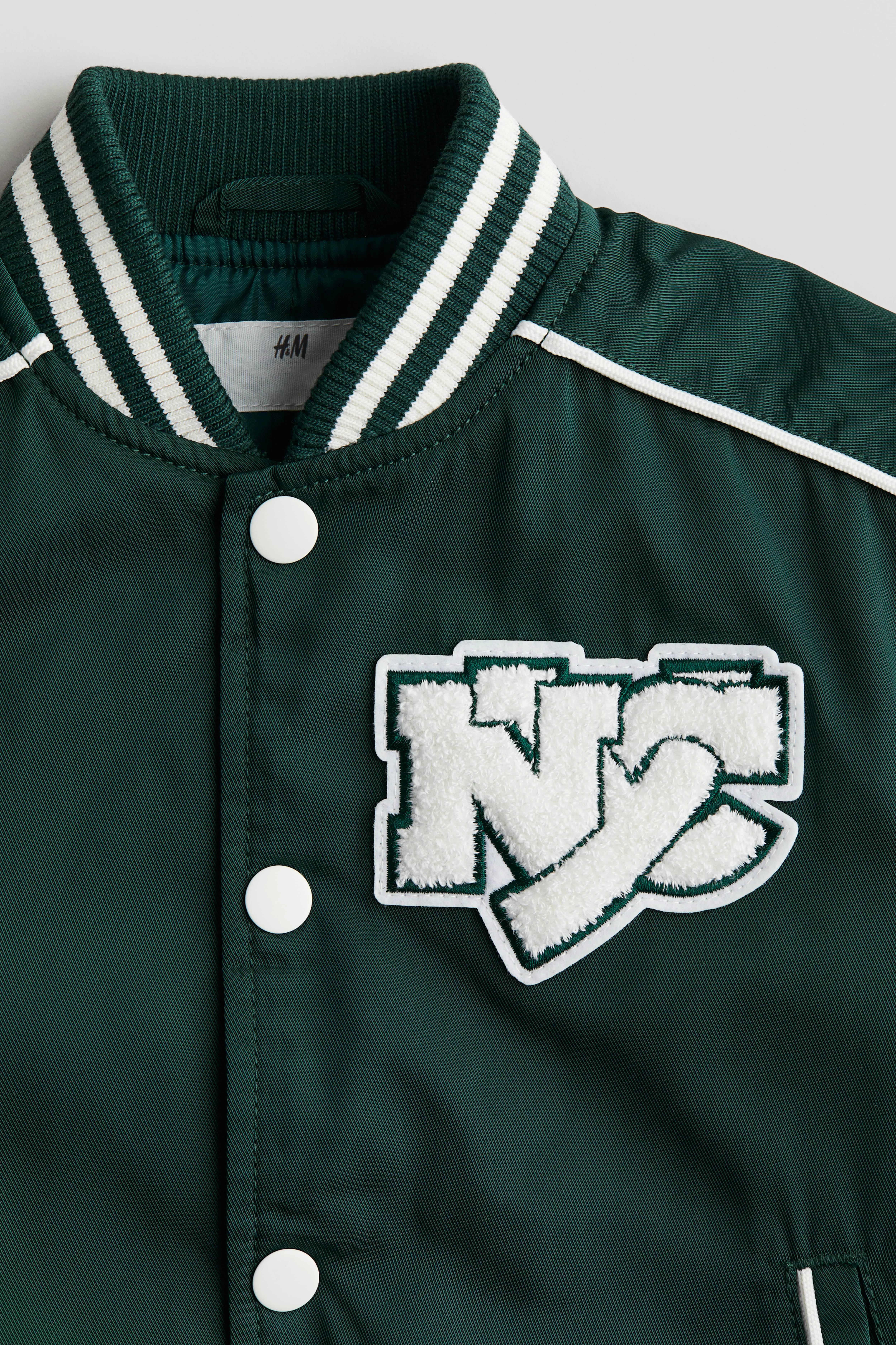 Padded baseball jacket - Crew-neck - Long sleeve - Dark green/NYC - Kids | H&M GB